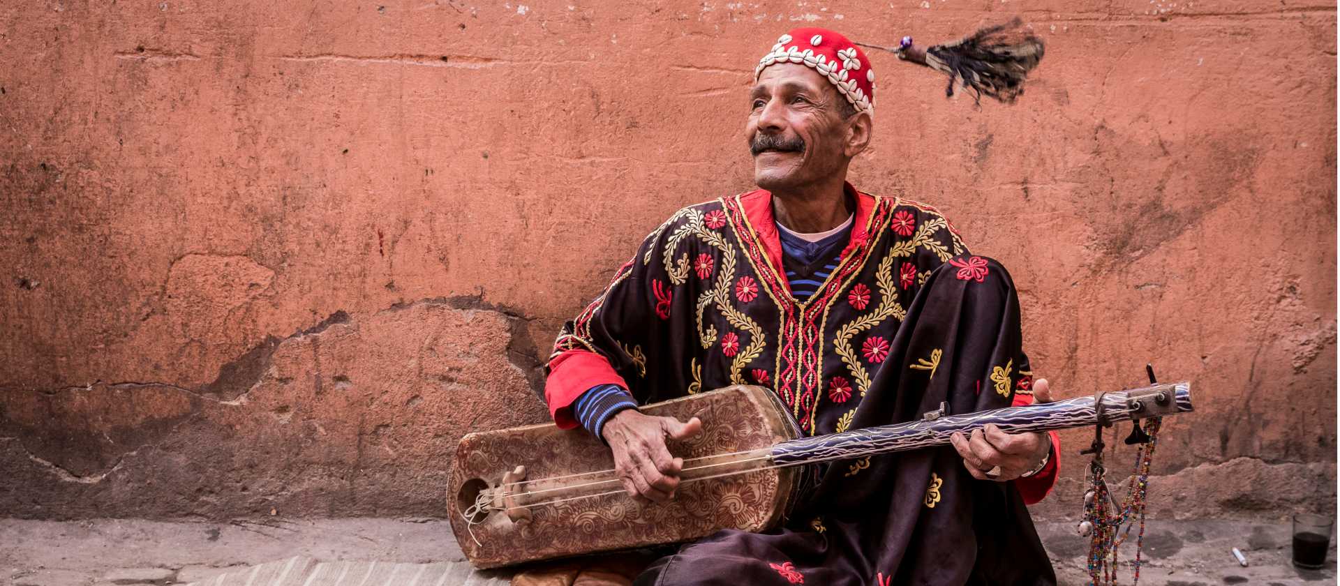 Musician plying his trade in the medina, Marrakesh | Richard I'Anson