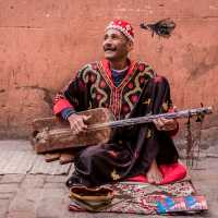 Musician plying his trade in the medina, Marrakesh | Richard I'Anson