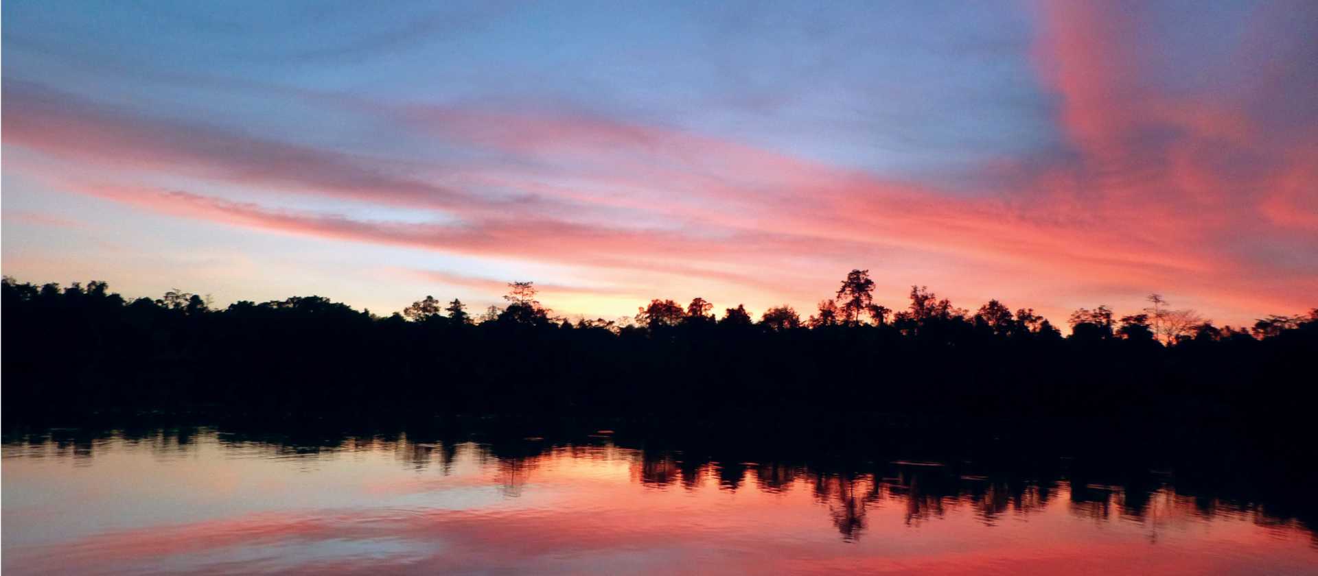 Beautiful sunset over Borneo | Caroline Mongrain