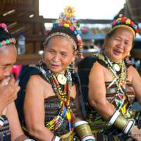 Iban women in traditional dress | David Kirkland