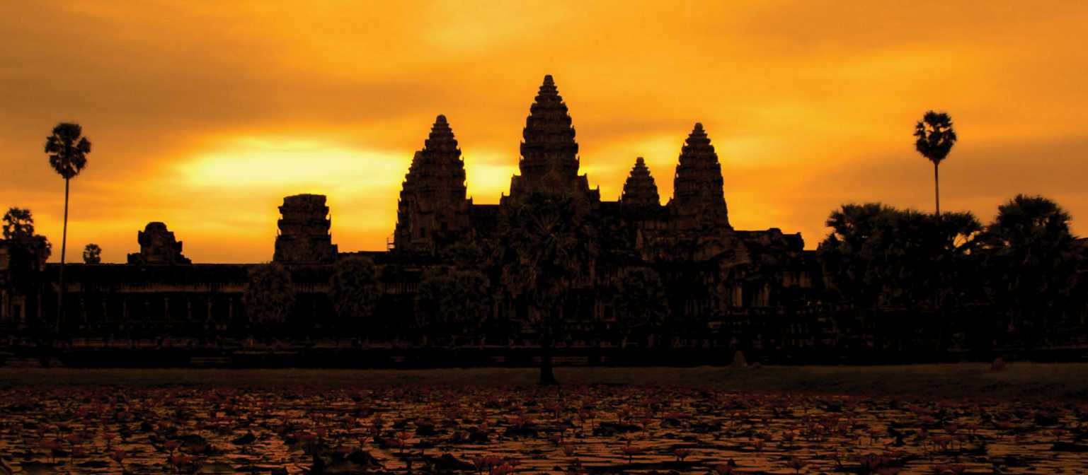 A golden sunrise over Angkor Wat at Siem Reap, Cambodia | David Lazar