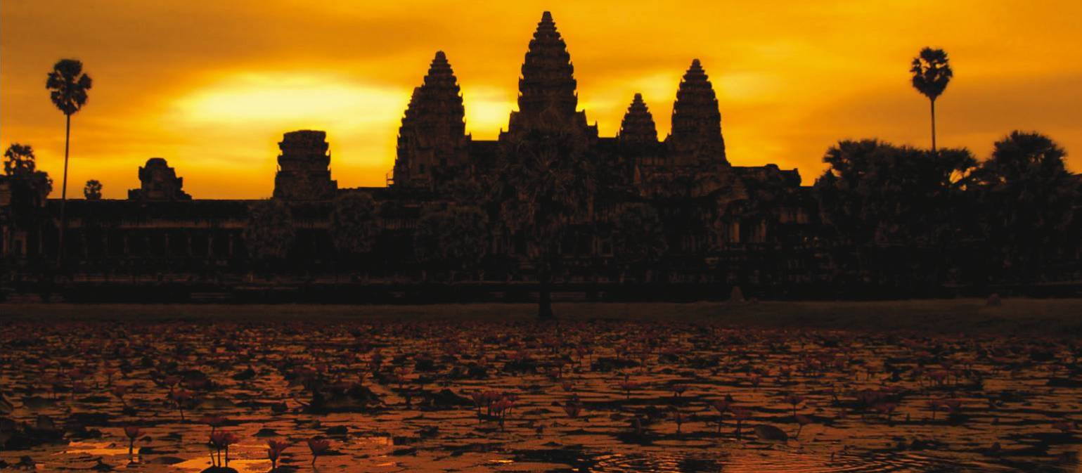 A golden sunrise over Angkor Wat at Siem Reap, Cambodia | David Lazar