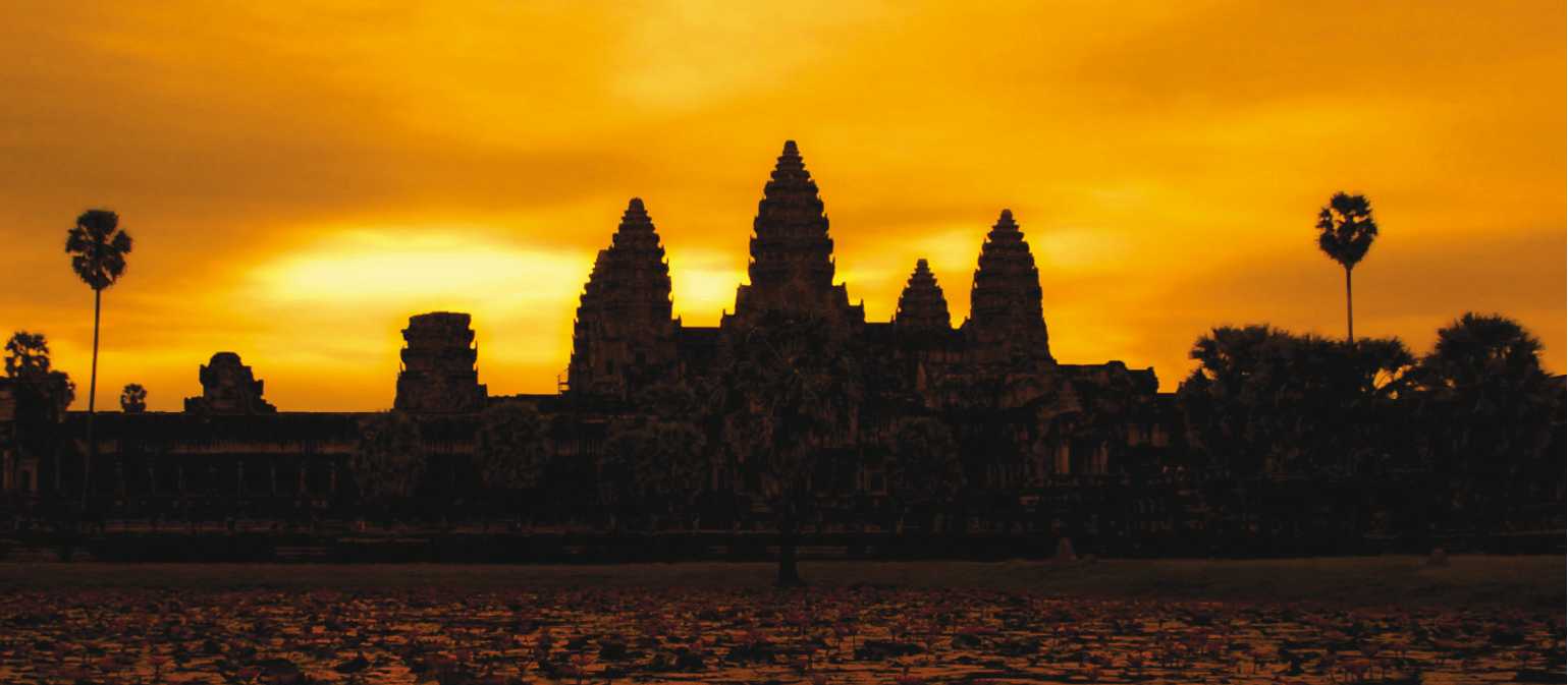 A golden sunrise over Angkor Wat at Siem Reap, Cambodia | David Lazar