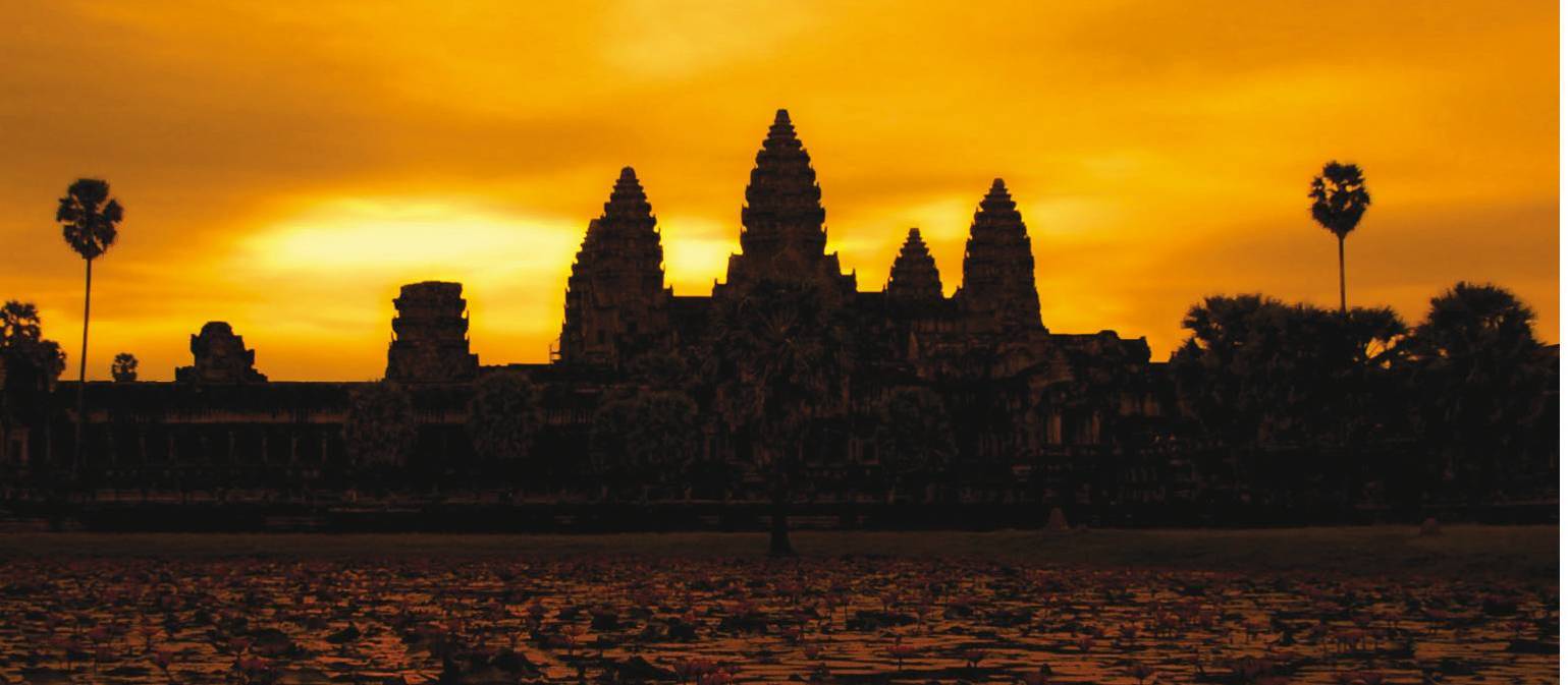 A golden sunrise over Angkor Wat at Siem Reap, Cambodia | David Lazar