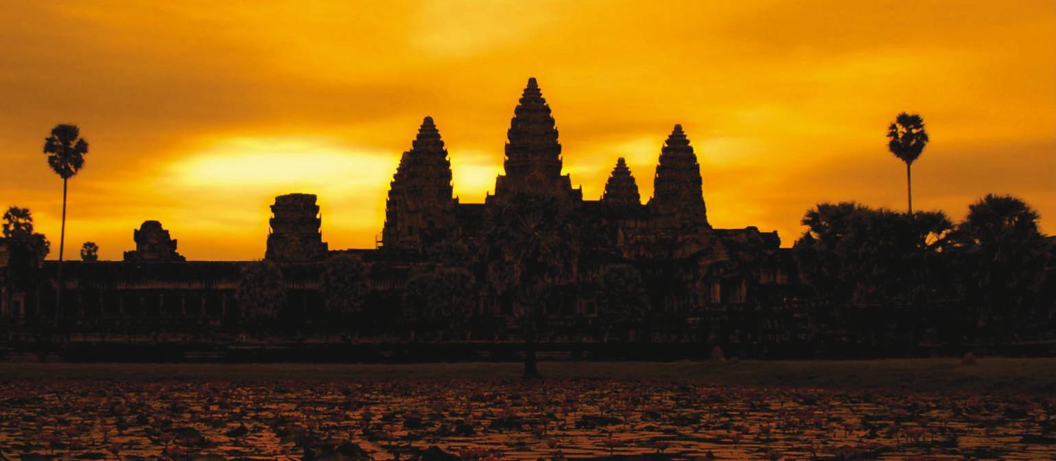 A golden sunrise over Angkor Wat at Siem Reap, Cambodia | David Lazar