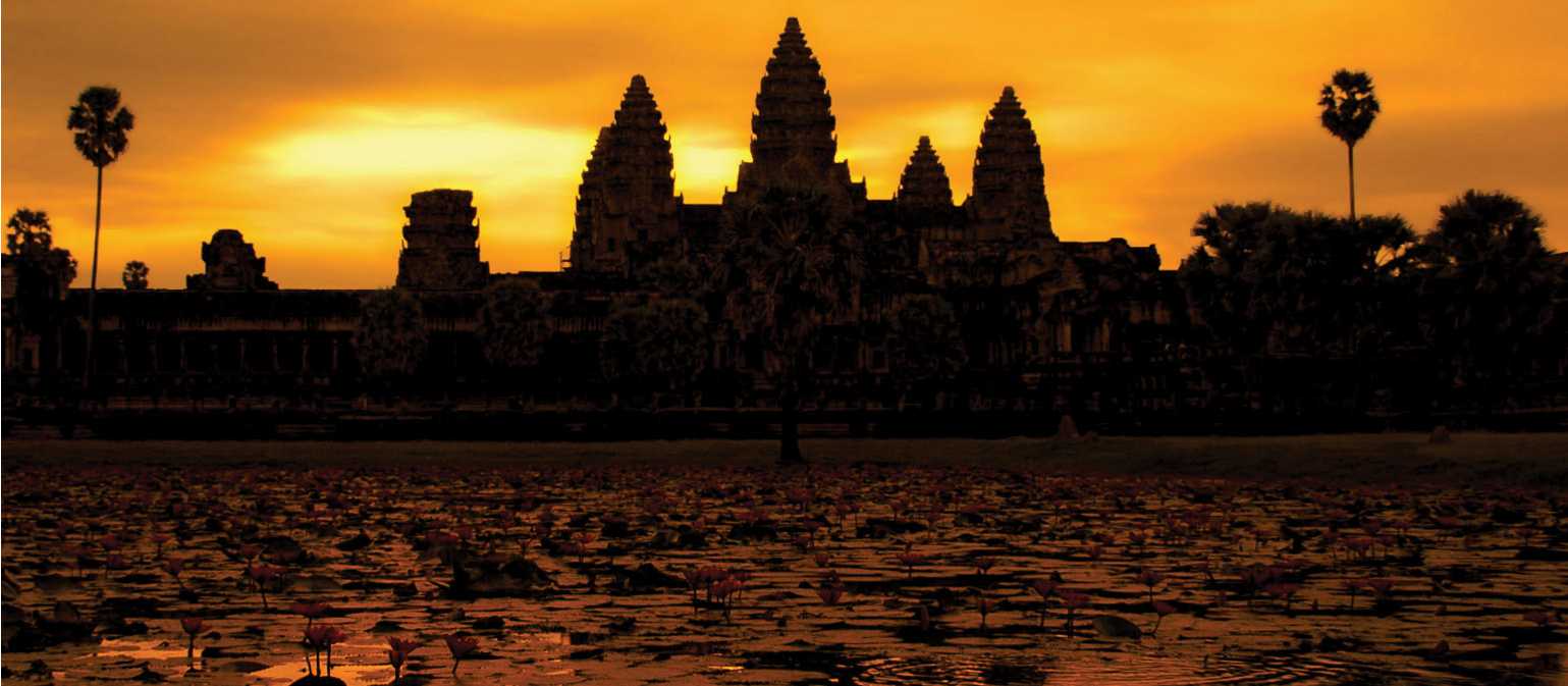 A golden sunrise over Angkor Wat at Siem Reap, Cambodia | David Lazar