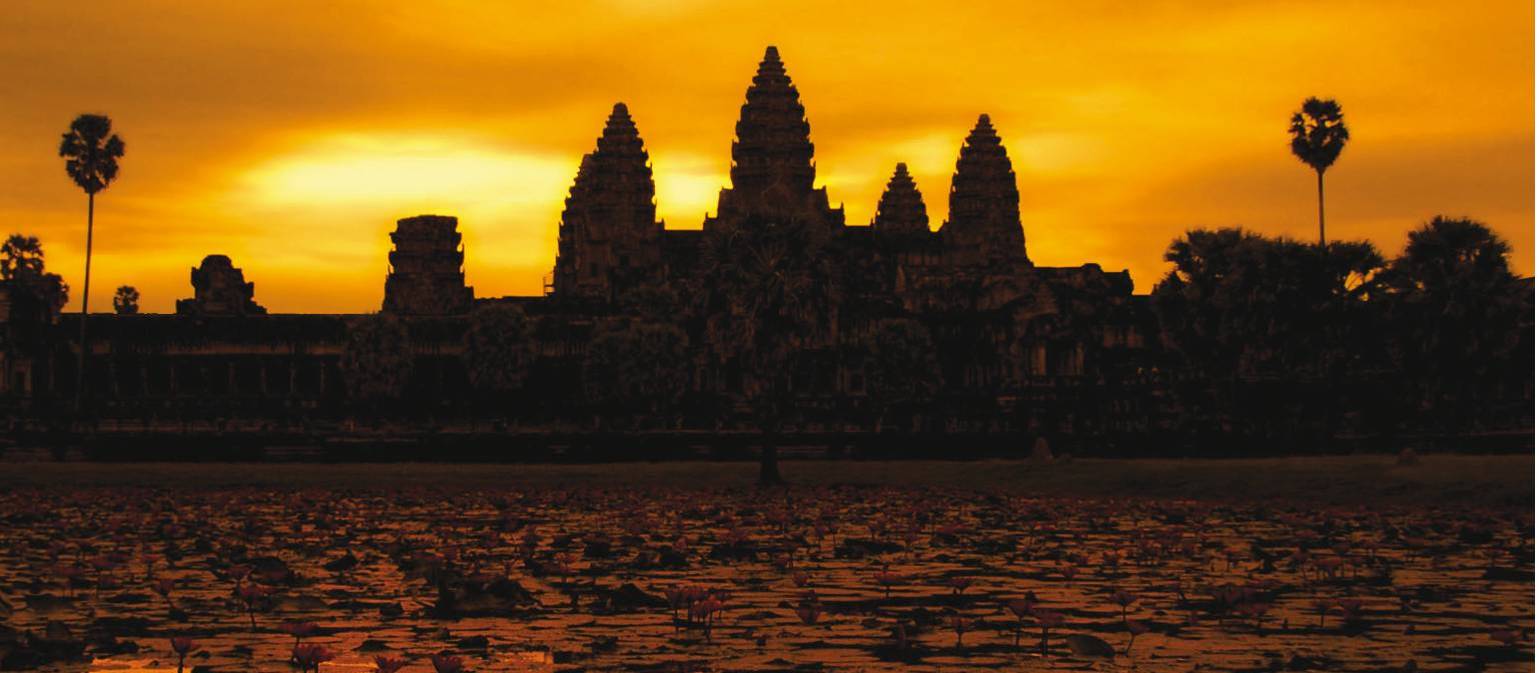 A golden sunrise over Angkor Wat at Siem Reap, Cambodia | David Lazar