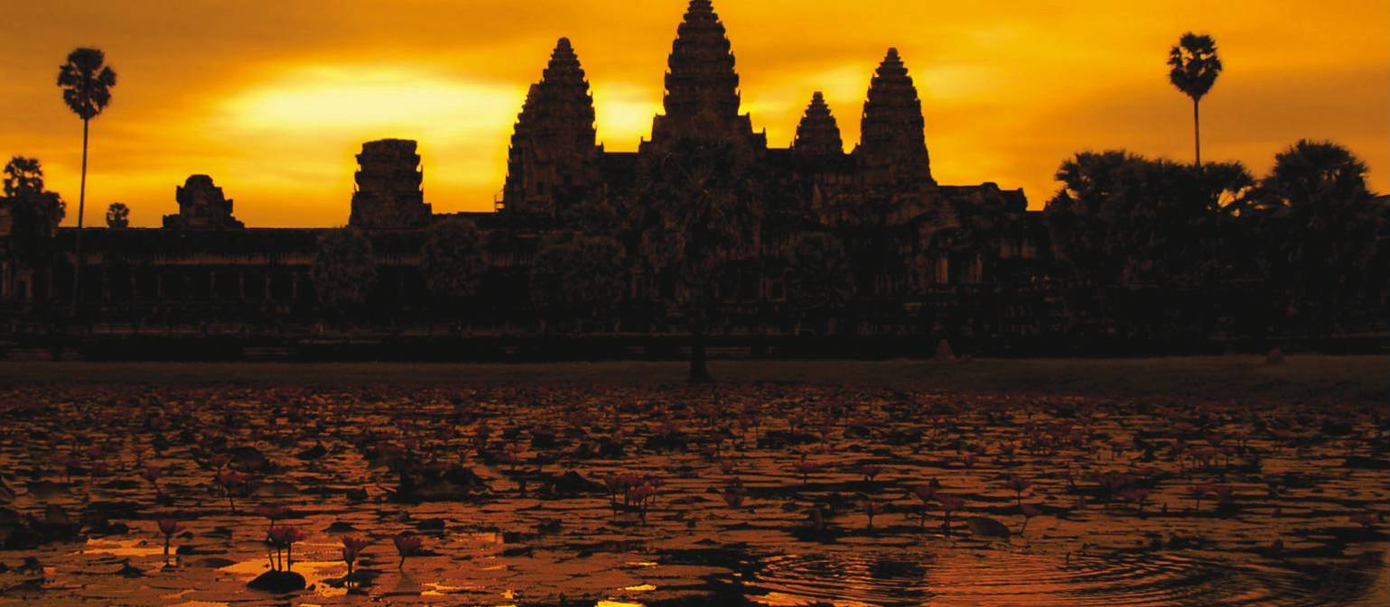 A golden sunrise over Angkor Wat at Siem Reap, Cambodia | David Lazar