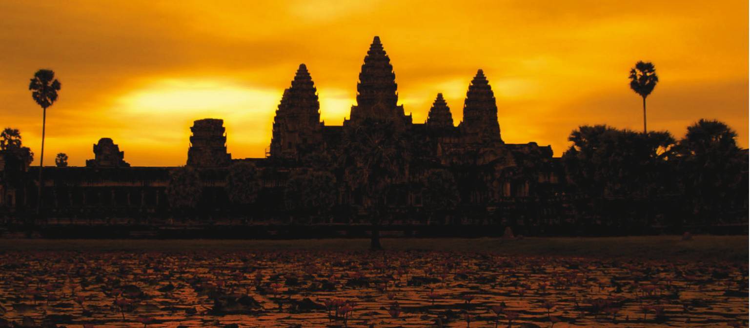 A golden sunrise over Angkor Wat at Siem Reap, Cambodia | David Lazar