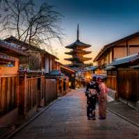 Historic streets of Higashiyama leading to Yasaka Pagoda at dusk.
 | Sorasak