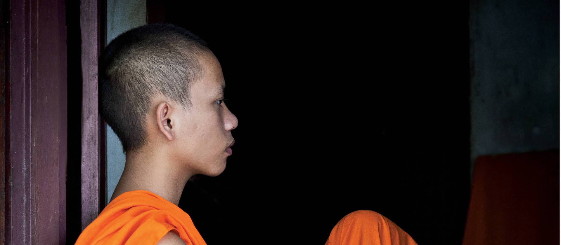 A novice monk in Luang Prabang | Peter Walton