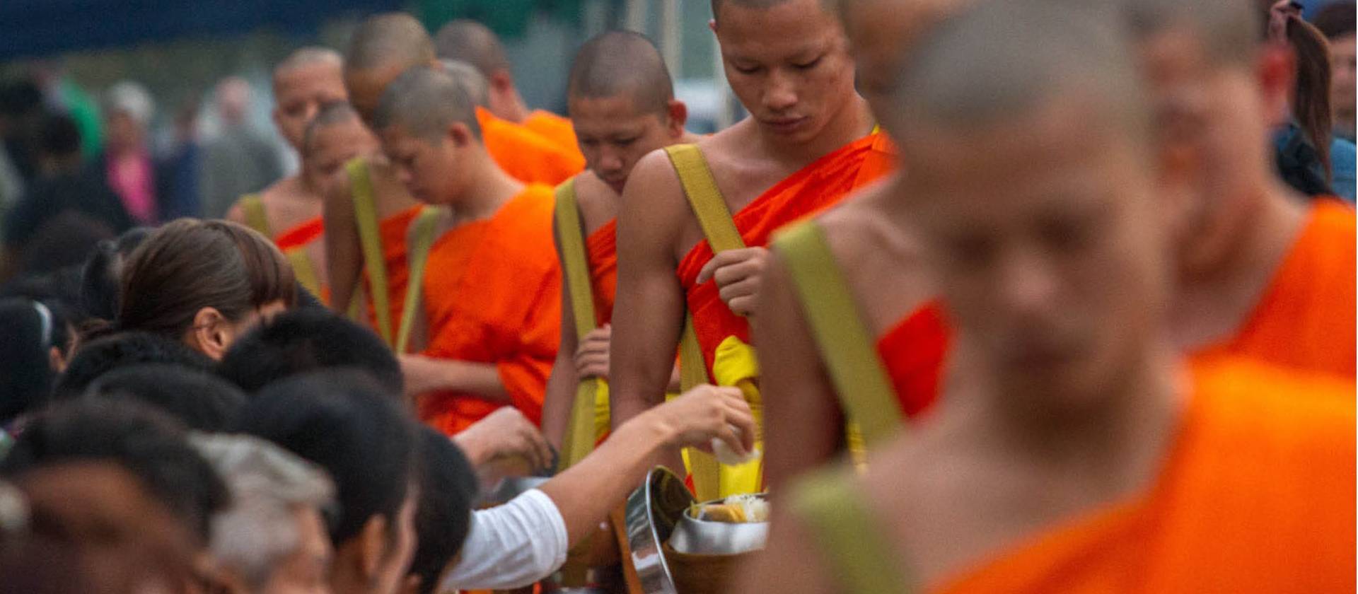 The centuries old daily Alms giving ritual, Tak Bat.
