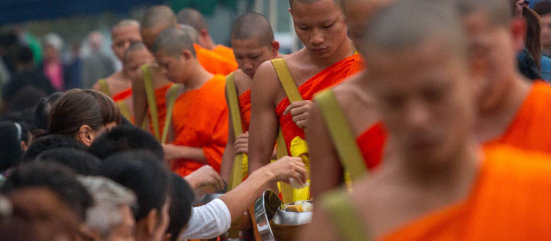 The centuries old daily Alms giving ritual, Tak Bat.