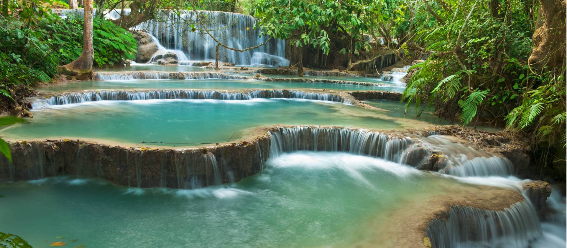 The enchanting turquoise pools of Kuang Si Falls