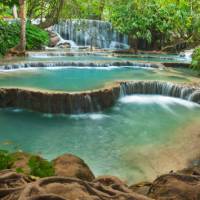 The enchanting turquoise pools of Kuang Si Falls