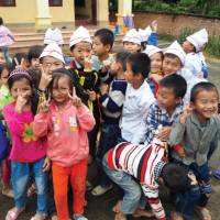 Happy school kids as we pass through Ham Yen | Scott Pinnegar