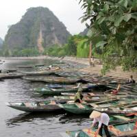 Dotted green mountains and lakes create this tranquil destination, Ninh Binh, Vietnam | Amanda Fletcher