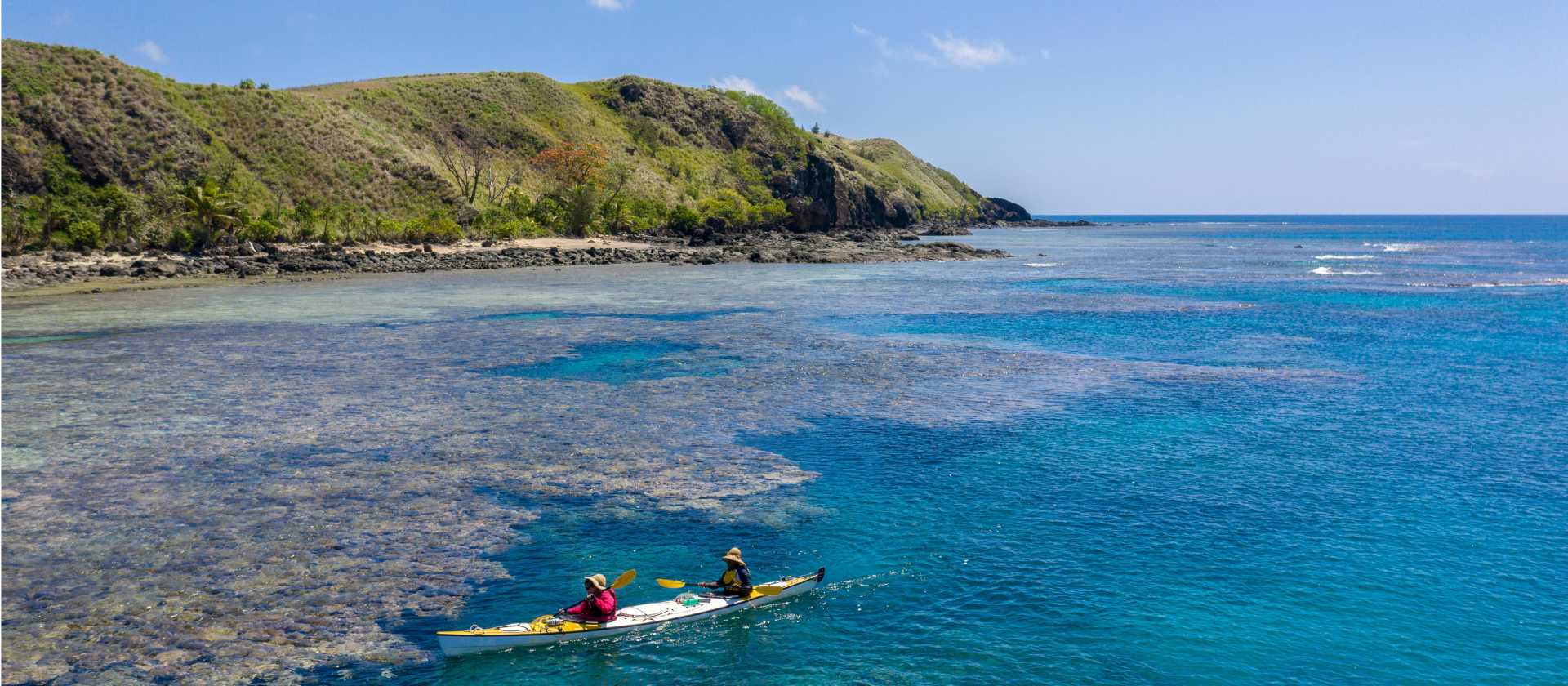 Sea kayaking through the tropical Yasawa Islands
