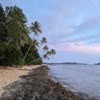 Unwind on palm-fringed beaches after rewarding days of paddling in Fiji’s island paradise