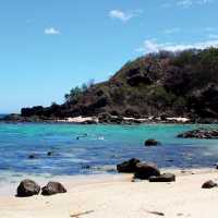 Fringing reefs running directly off the beach front near Tavewa Island | Kylie Turner