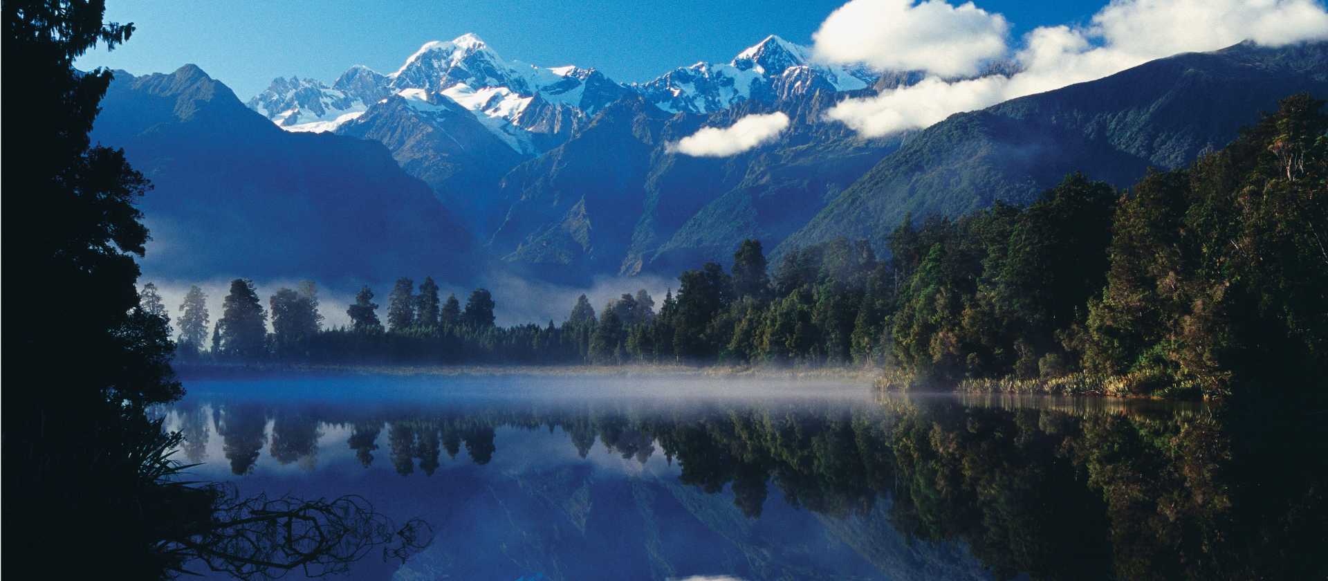 New Zealand’s tallest peaks – Mount Cook and Mount Tasman reflect off Lake Matheson | Rob Suisted