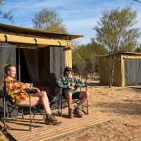 Trekkers relaxing on the porch of their campsites | Shaana McNaught