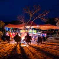 Relaxing around an open fire after a day on the Larapinta Trail | Caroline Crick