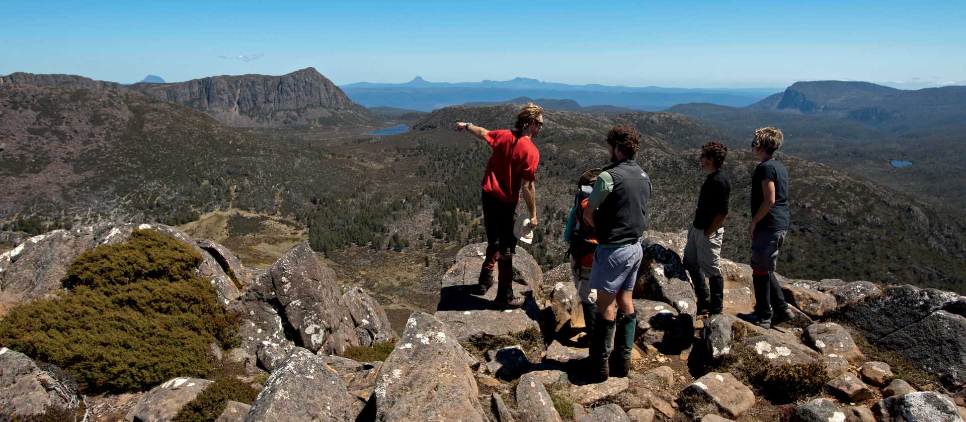 Trekkers enjoying the view with their Tasmanian Expeditions guide from the summit of Mt Jerusalem | Don Fuchs
