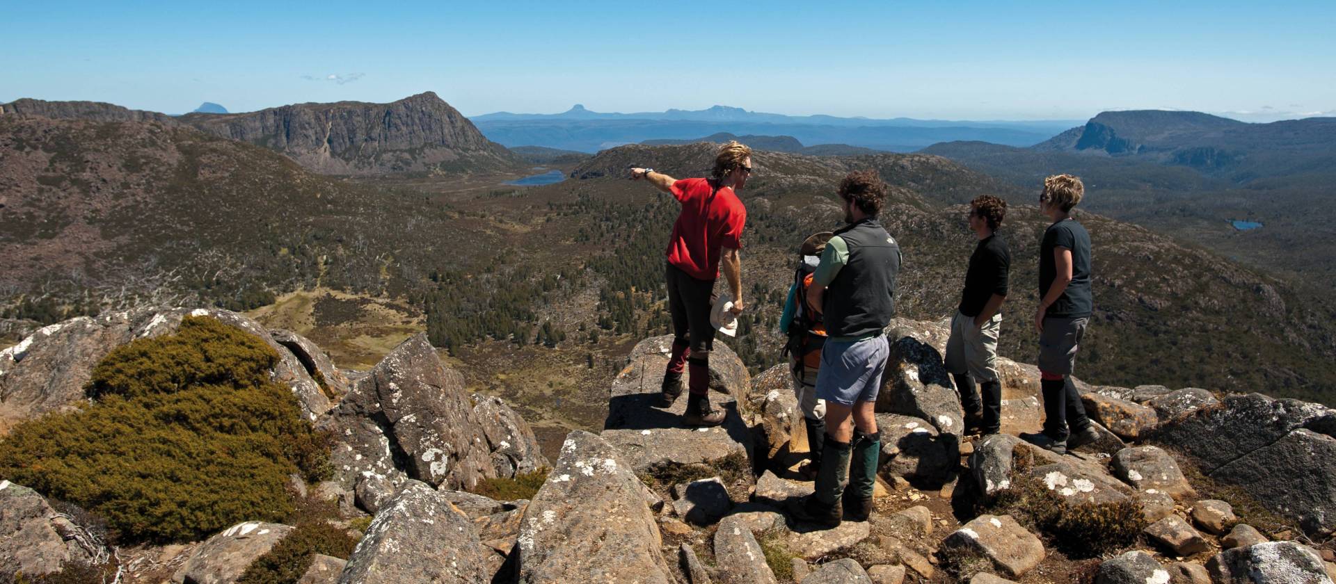 Trekkers enjoying the view with their Tasmanian Expeditions guide from the summit of Mt Jerusalem | Don Fuchs