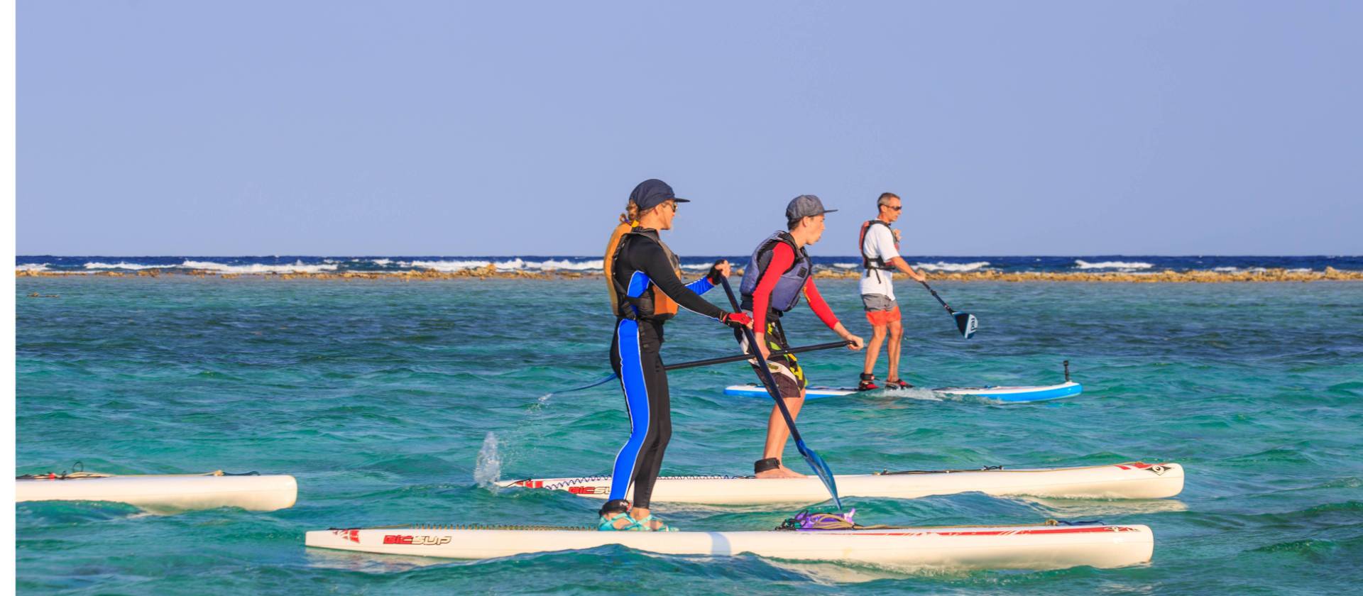 Paddling along the turquoise waters on a clear day