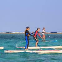 Paddling along the turquoise waters on a clear day