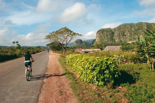 Cycling through the verdant Vinales Valley in Cuba&#160;-&#160;<i>Photo:&#160;Carlie Ballard</i>