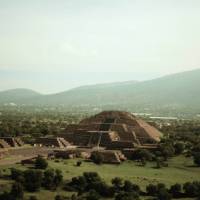 The Teotihuacan Pyramids site is known for its beautiful murals, extensive residential complexes, and the Avenue of the Dead,