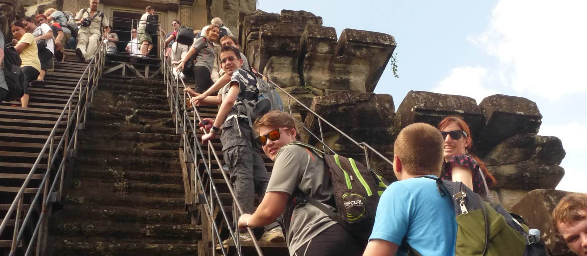 Students exploring Angkor Wat | John Nichol