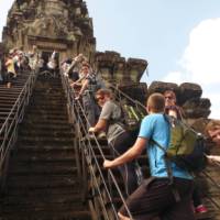 Students exploring Angkor Wat | John Nichol
