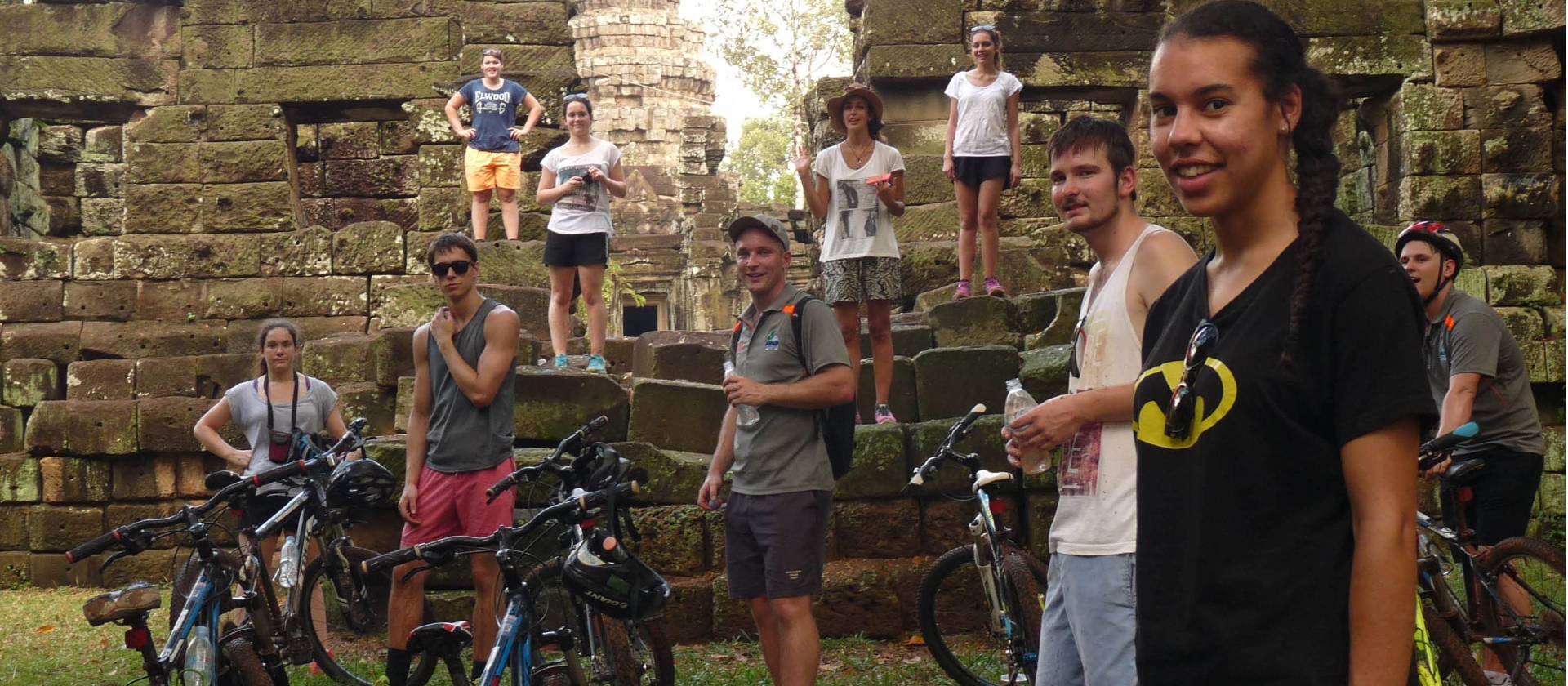 Students cycling around Angkor Wat | John Nichol