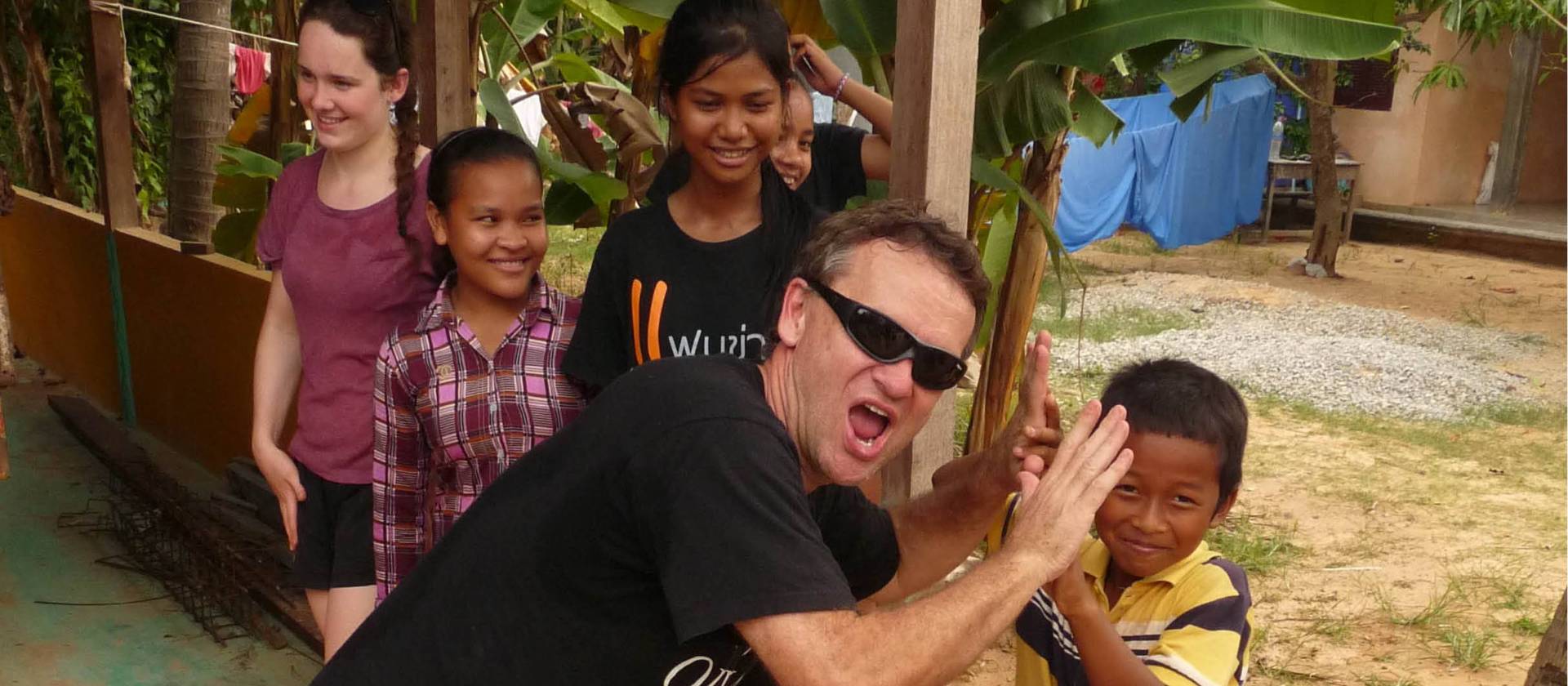 High fives all round in Cambodia | John Nichol