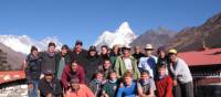 School group in Nepal, Ama Dablam towers behind them | Greg Pike