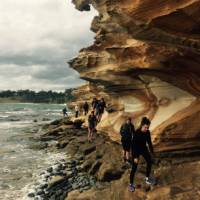 School group exploring the Painted Cliffs on Maria Island | Holly Van De Beek