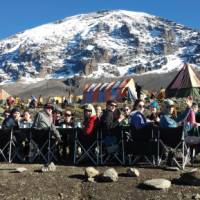 Breakfast under a clear blue sky and under the watchful eye of the Mountain, Karanga Camp | Eva Moons