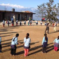 Playing with the local school children at the project site