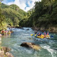 Rafting through rapids like the Cheese Grind on the Barron River, Far North Queensland | Tourism and Events Queensland