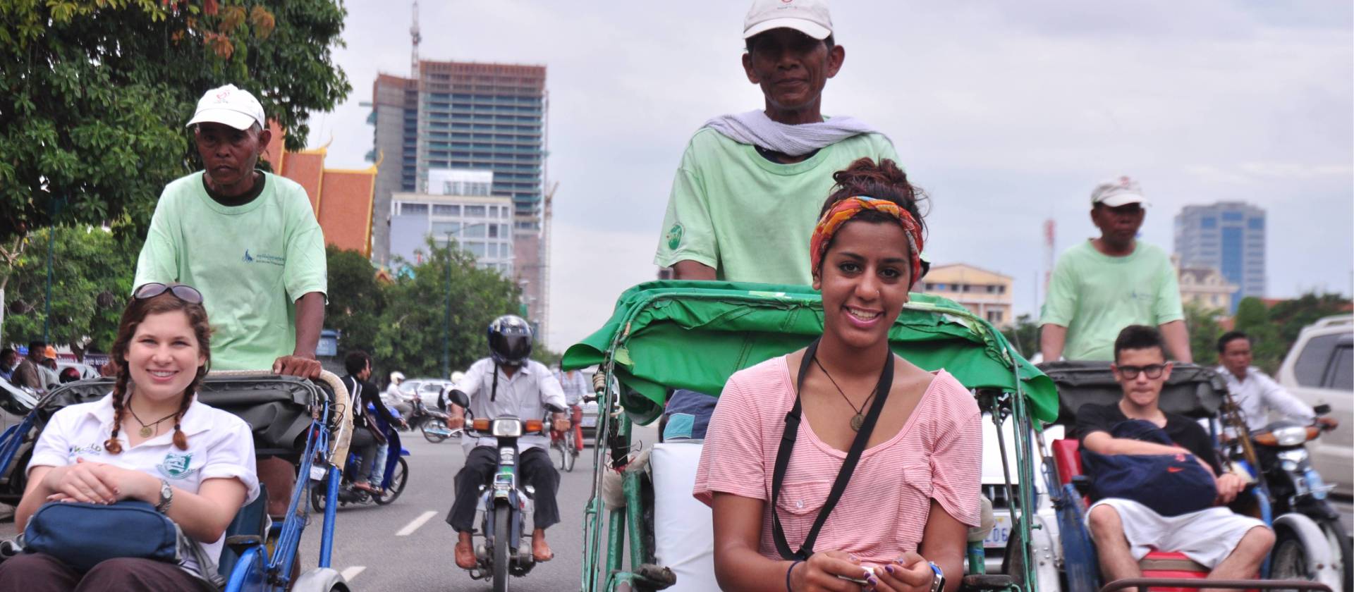 Students on a rickshaw tour, Cambodia