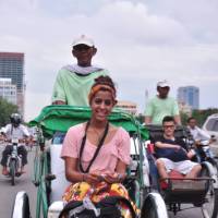 Students on a rickshaw tour, Cambodia