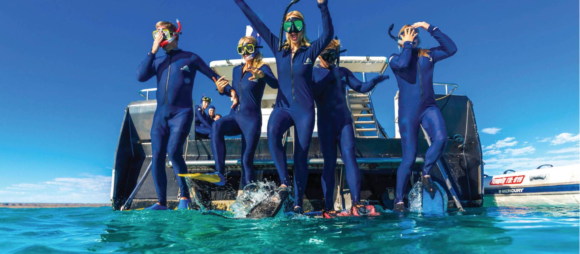Students snorkelling off the coast of Exmouth, Ningaloo Reef | Tourism Western Australia