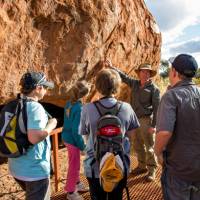 Ranger guided walk around the base of Uluru | Tourism NT/Shaana McNaught