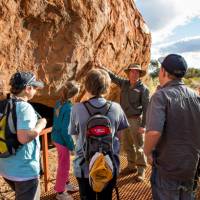 Ranger guided walk around the base of Uluru | Tourism NT/Shaana McNaught