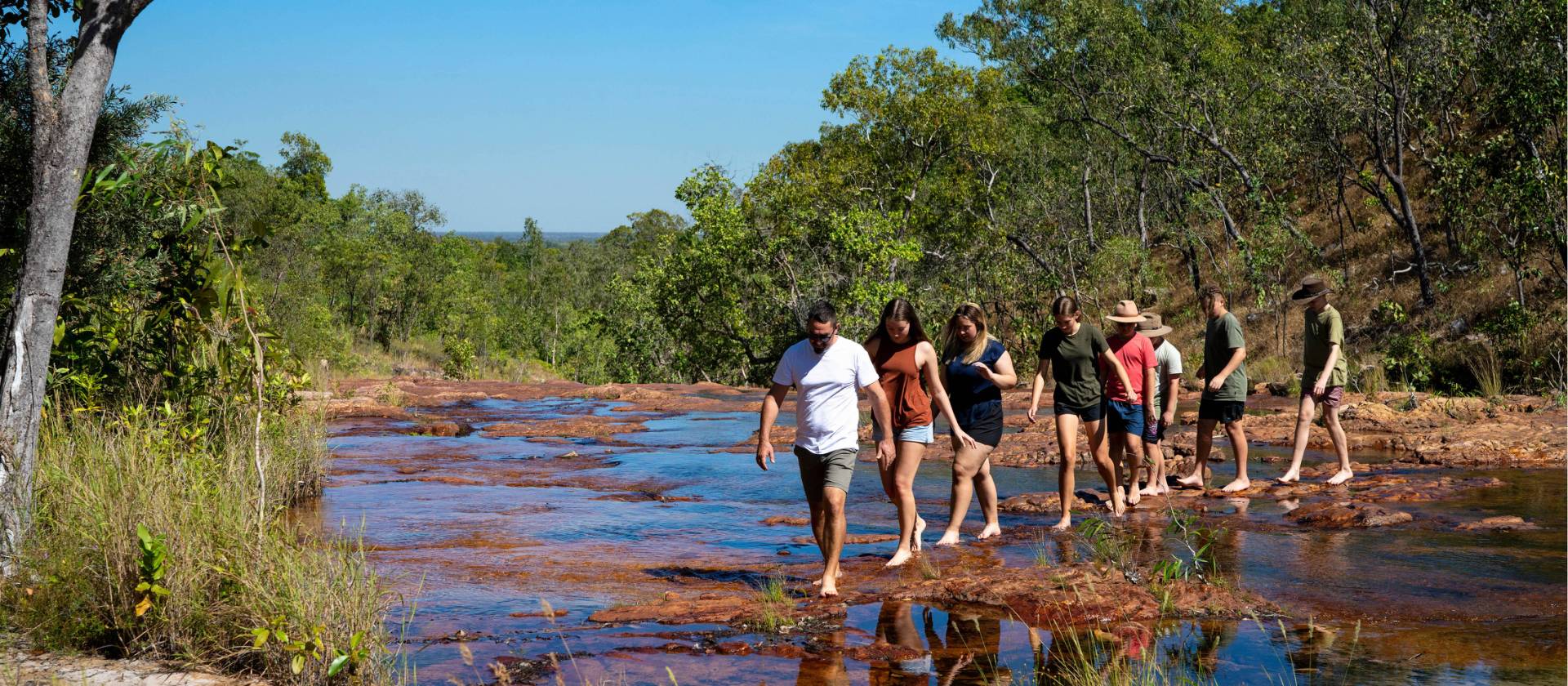Students hiking in Kakadu National Park | Tourism NT/Shaana McNaught