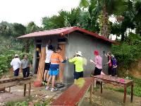 Students constructing new toilets for a remote school in Vietnam