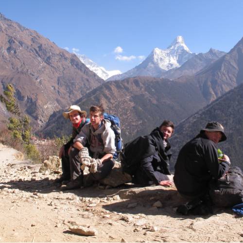 Resting during a school trek in Nepal